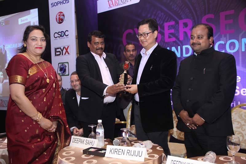 Felicitating Shri. Kiren Rijiju, MoS for Home Affairs, Govt. of India with a Memento