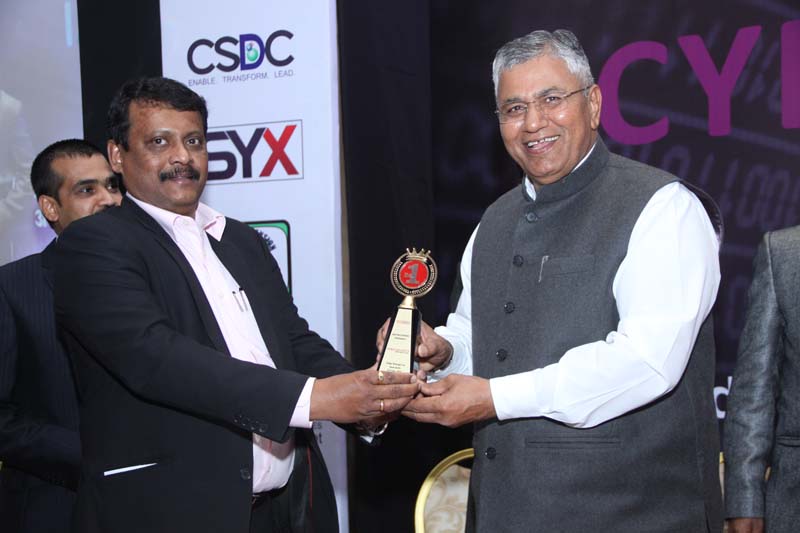 Mr. Deepak Kumar Sahu, Chief editor, VARINDIA giving Memento to Shri. P.P. Chaudhary, MoS for Electronics & IT, Law & Justice, Govt of India