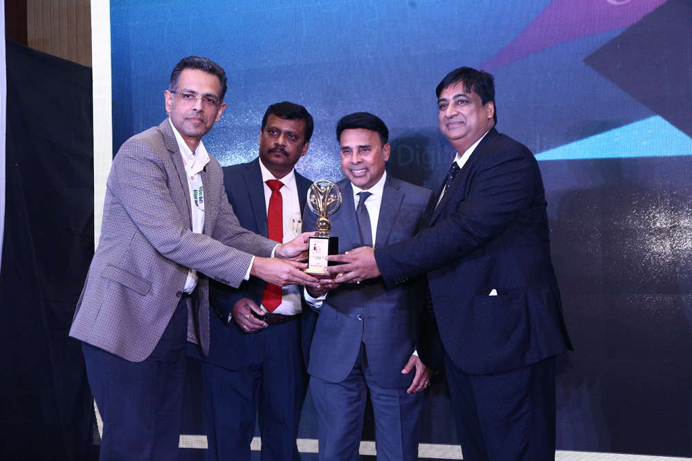SIFY TECHNOLOGIES receiving the award for ICT COMPANY OF THE YEAR from Mr. Deepak Sahu, Publisher & Group Editor, VARINDIA and SPOI, Mr. Dan Mishra, C