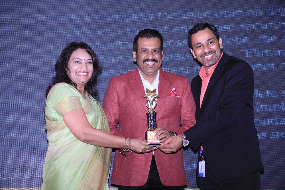 Essen Vision Software receiving  the award for the Best Security Partner at VAR Symposium - 17th Star Nite Awards 2018