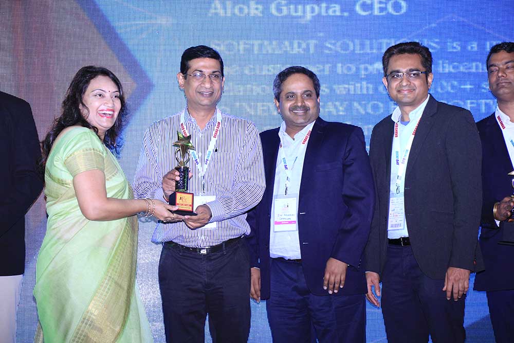 Softmart Solutions receiving the award for the Best Sub Distributor at VAR Symposium - 17th Star Nite Awards 2018