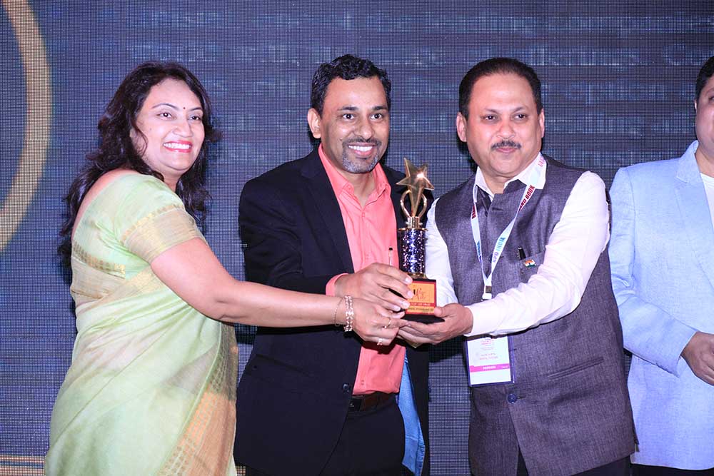 Unistal Systems receiving the award for the Best Security Partner at VAR Symposium - 17th Star Nite Awards 2018