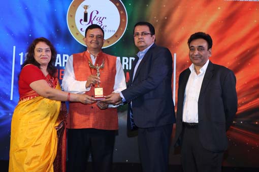 The CMO Award being given away by Mr. Rajesh Aggarwal, D.G- Training, Ministry of Skill Development, Govt. of India; Mr. S. N.Tripathi, Director-India