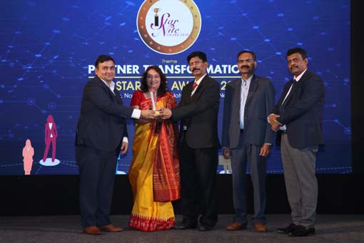 The BEST ENTERPRISE SECURITY SOLUTION Award goes to McAfee India Sales Pvt. Ltd. being given away by Dr. B K Murthy, Scientist G and Group Head (R&D i