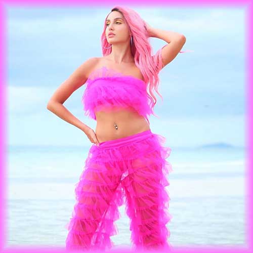 Nora Fatehi beets the heat with her hot pink strapless crop top Nora Fatehi beets the heat with her hot pink strapless crop top